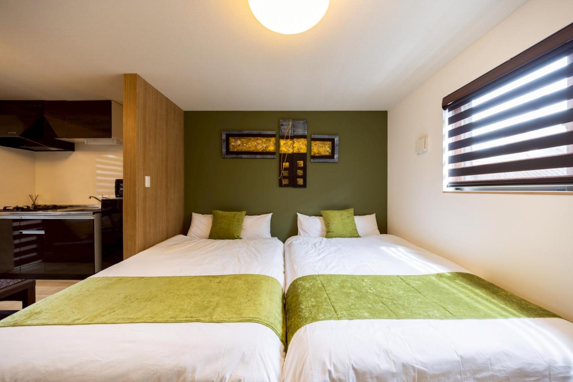 Apartment Hotel Stay The Osaka Izumisano Bagian luar foto