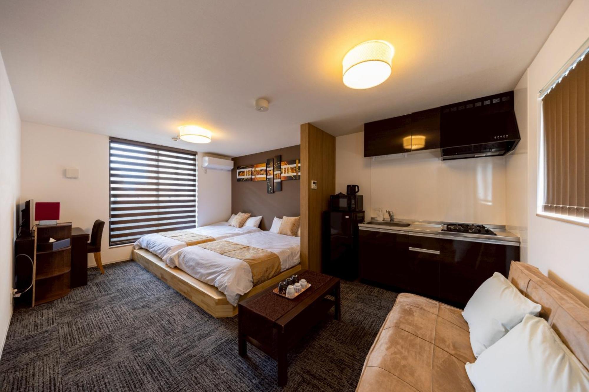 Apartment Hotel Stay The Osaka Izumisano Bagian luar foto
