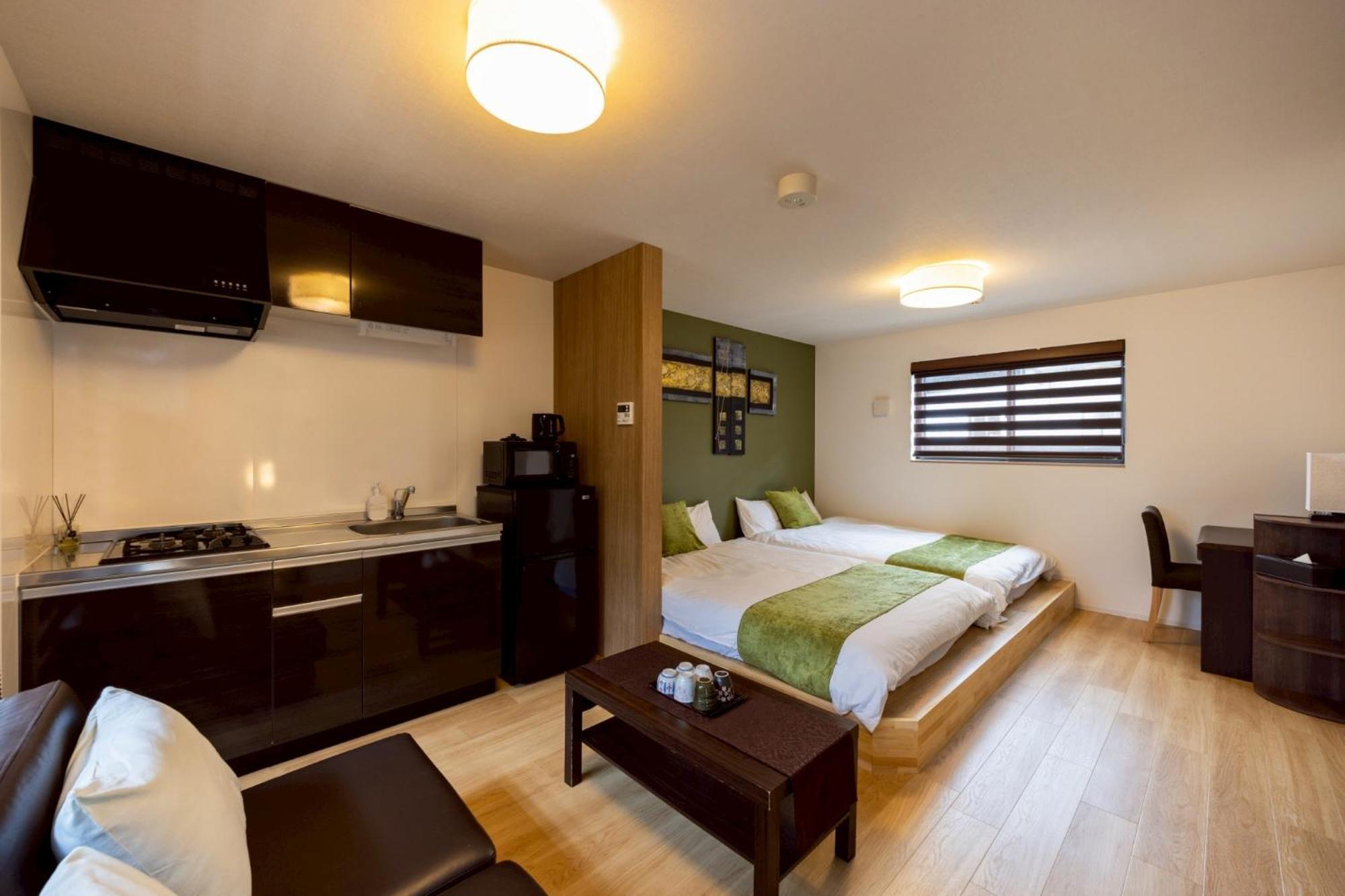 Apartment Hotel Stay The Osaka Izumisano Bagian luar foto