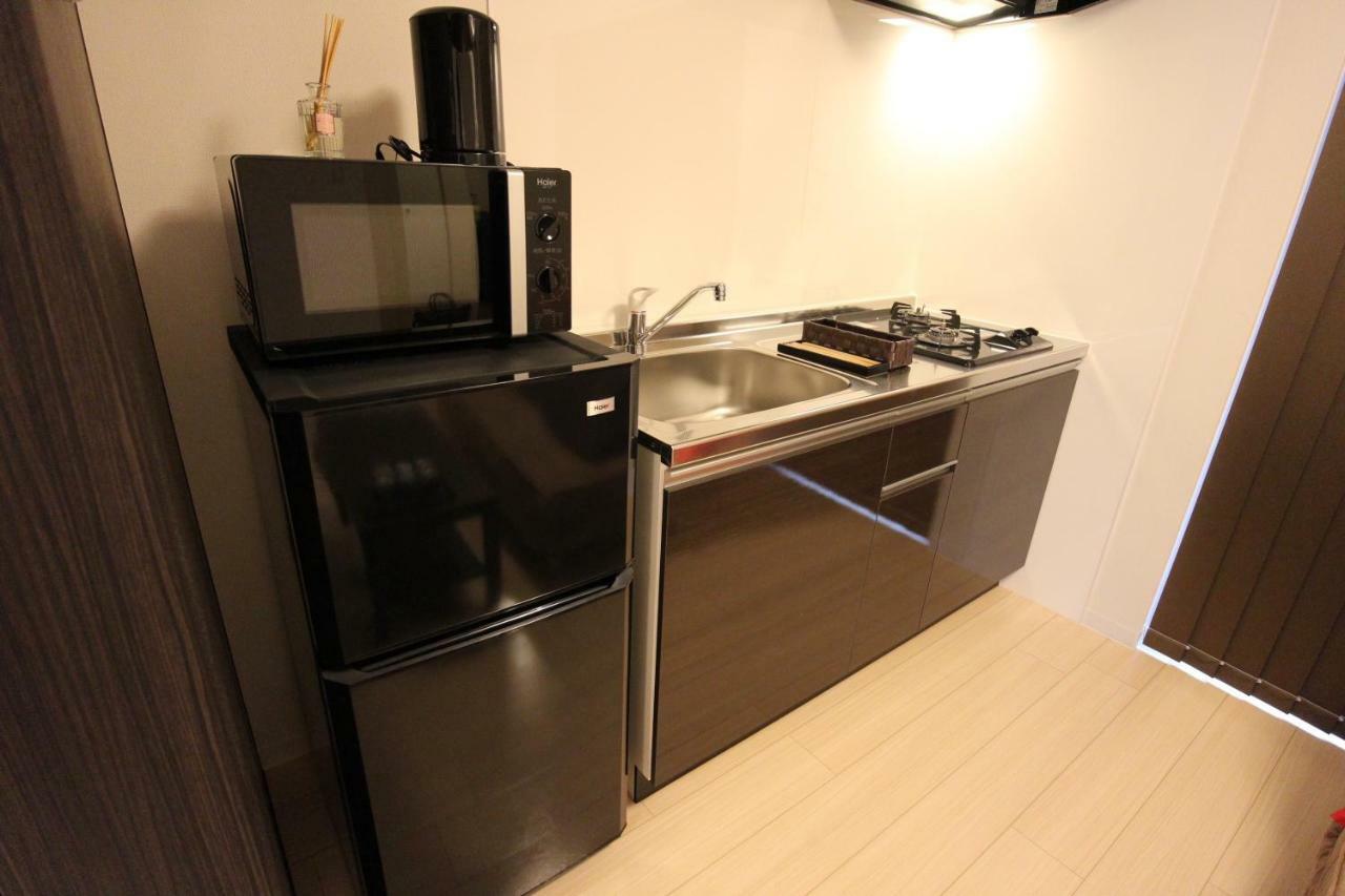 Apartment Hotel Stay The Osaka Izumisano Bagian luar foto